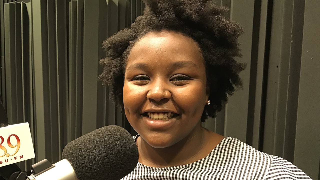 Brenda at the microphone