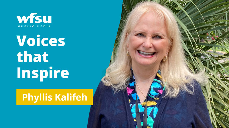 blonde woman smiling at camera