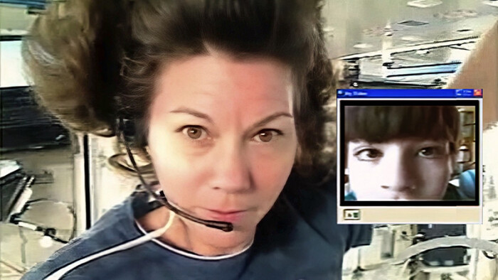 woman speaking with boy on video chat