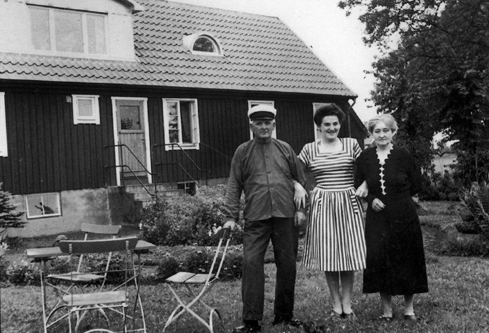 Black and white photo of three people