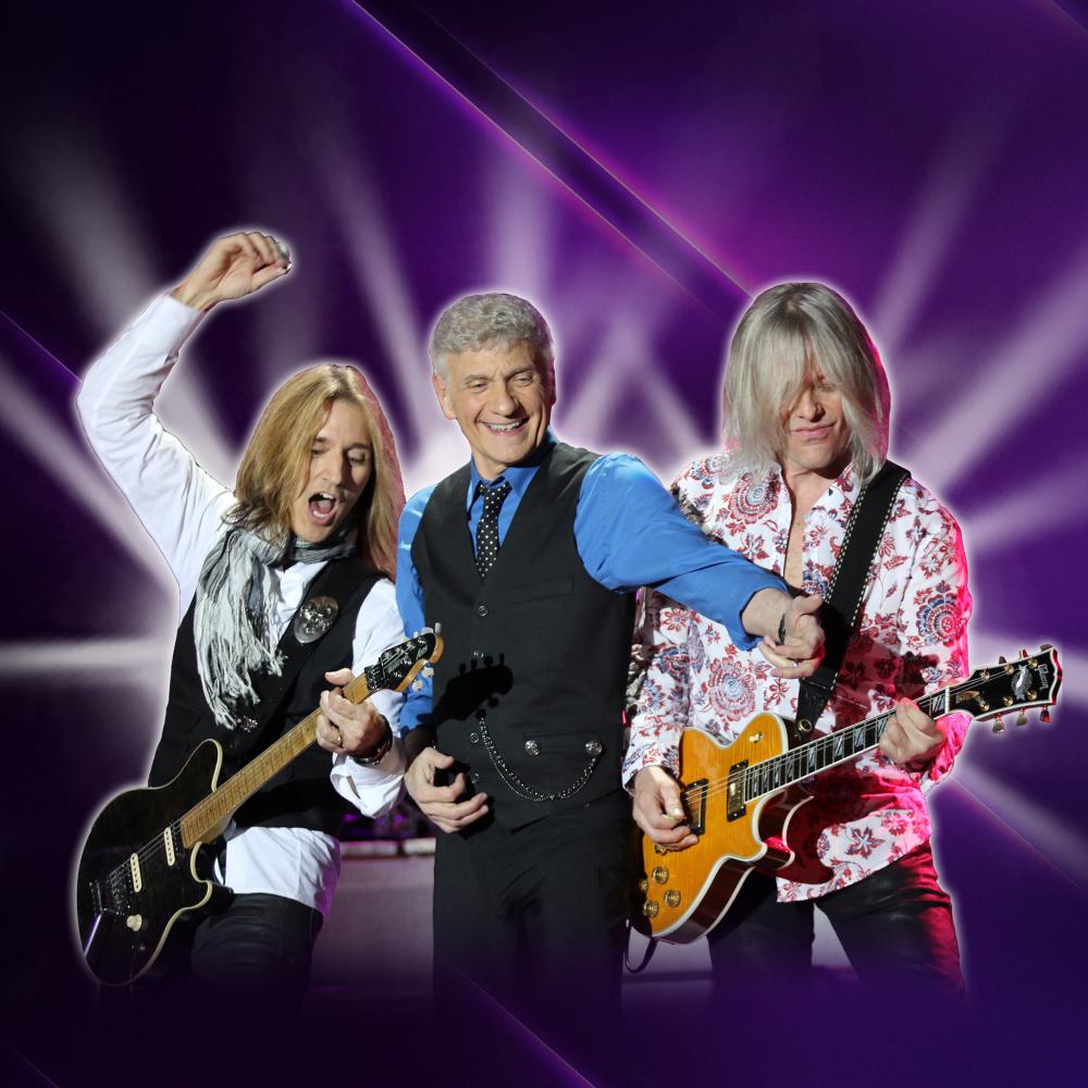 Three awesome rock n roll stars going crazy in front of a purple backdrop, one is even playing the air guitar.