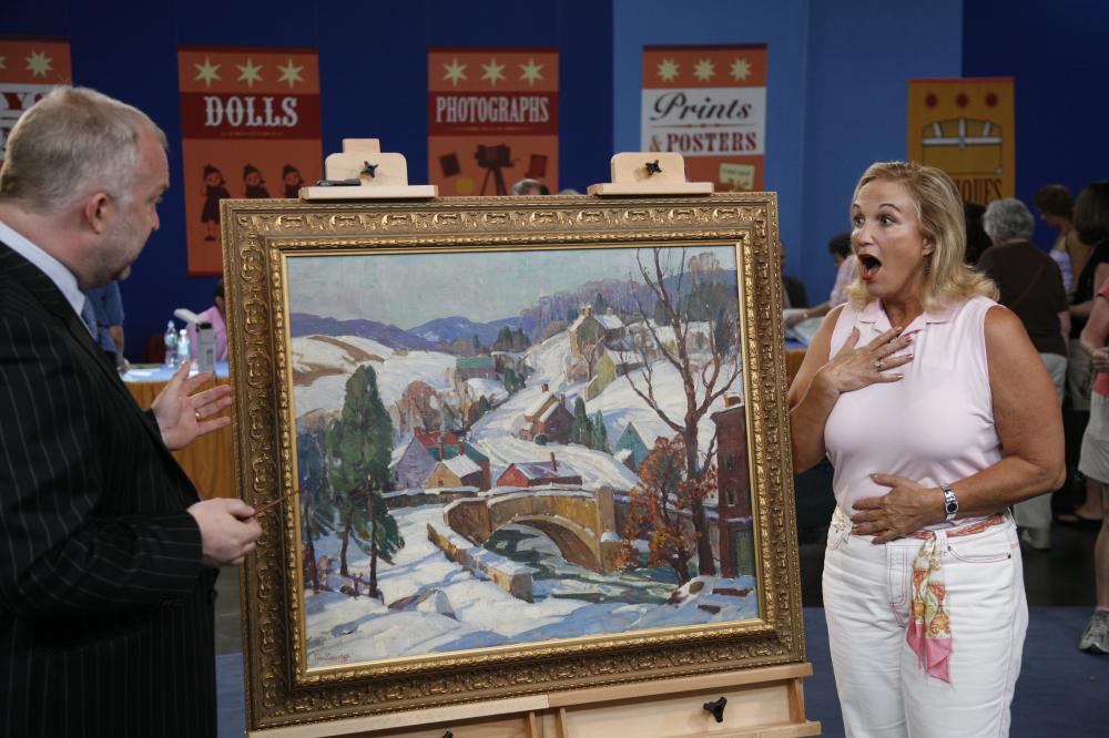 A woman gasping at a painting