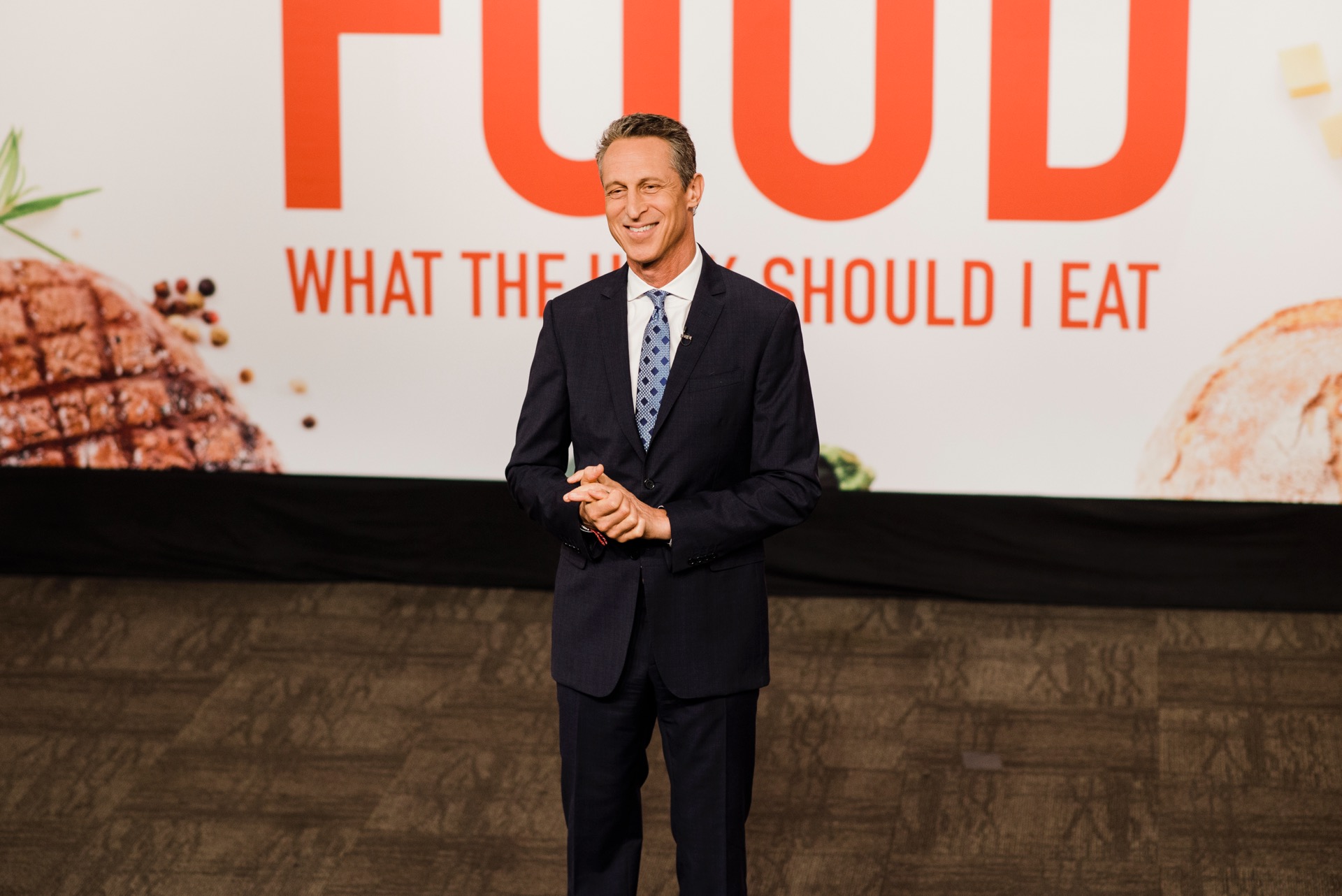 Mark Hyman, MD in front of the Food logo