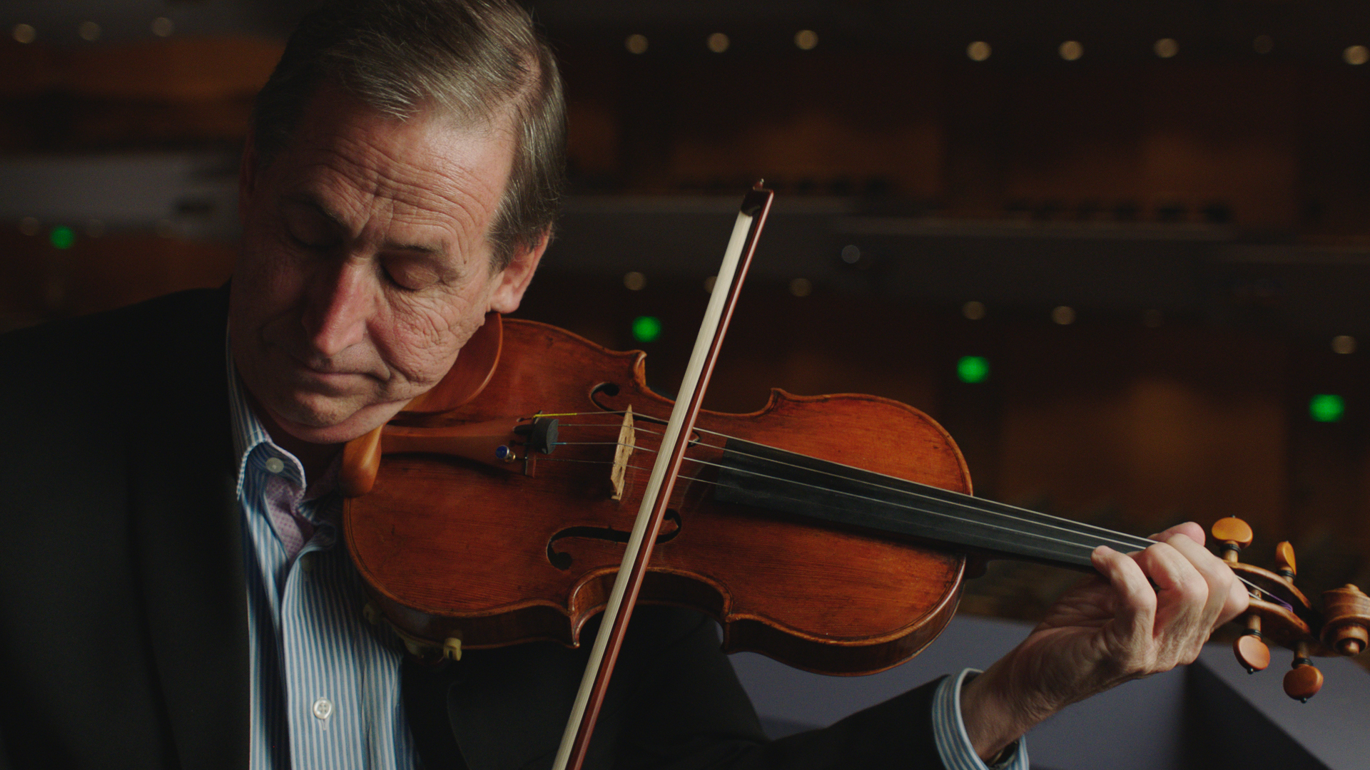 man playing a violin