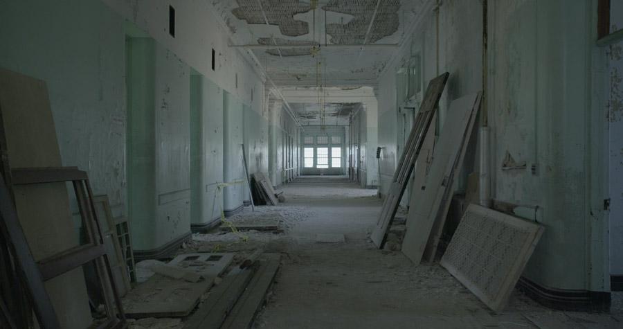 asylum hallway, dark and in disrepair